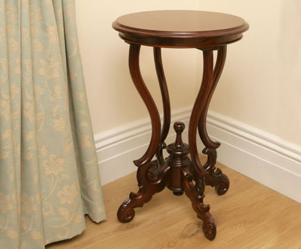 Polished birdcage wine table
