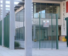 Bi-folding steel security entrance gates