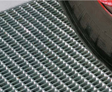 Pressure-locked mild steel floor gratings