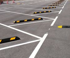 Wheel Stops - recycled rubber car park bay marker with reflective stripes