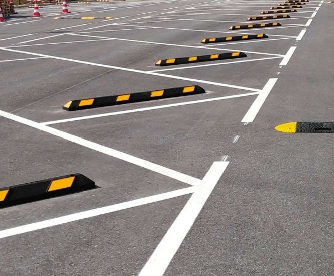 Wheel Stops - recycled rubber car park bay marker with reflective stripes