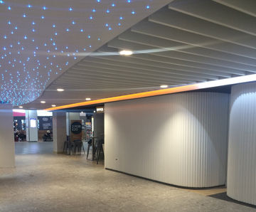 Shutters secure curved shopfronts at Newcastle Airport