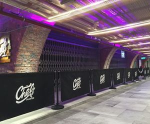 Bespoke collapsible security gates - Bolton Market Place