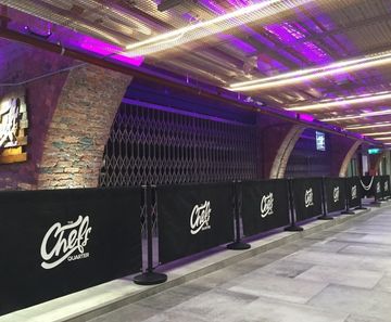 Bespoke collapsible security gates - Bolton Market Place