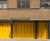 Bespoke folding shutters secure charity warehouse 1