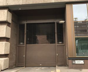 Hybrid grille / shutter for loading bay at Puddle Dock