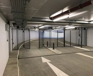 Bi-folding gates secure car park for Chelsea apartments