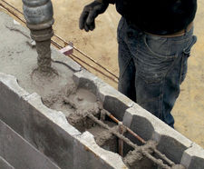 Stepoc concrete shuttering system - hollow blocks for retaining walls