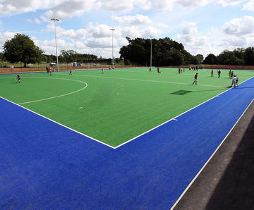 Artificial sports surface construction