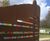 Corten steel and coloured glass screen mining memorial 3