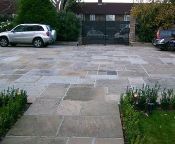 Reclaimed natural stone products and materials