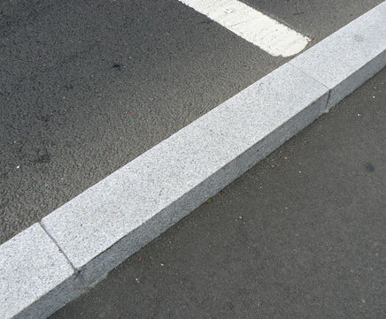 Straight silver grey granite kerbs