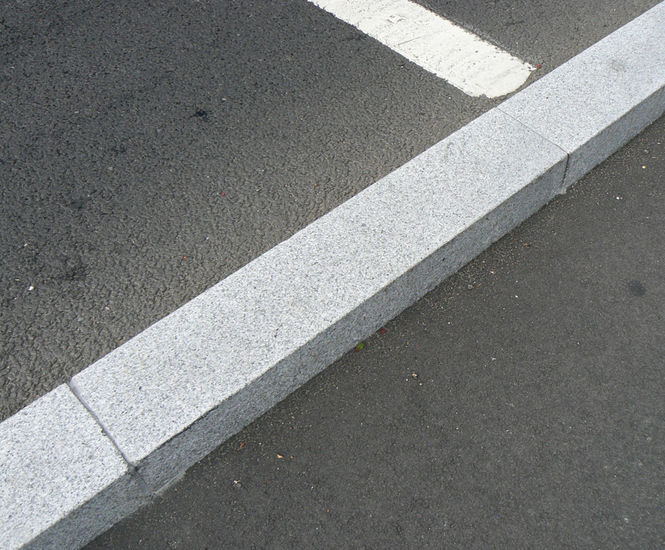 Straight silver grey granite kerbs