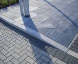 Silver grey granite dropper kerb for road access transitions - on this page