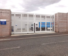 Sliding and hinged security gates for supermarket depot