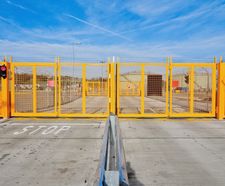 High security interlock bi-fold gate system for airport