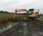 Clearing a watercourse at Shotley Gate Marshes