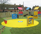 Playsafe impact-absorbing playground safety surfacing