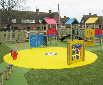 Playsafe impact-absorbing playground safety surfacing