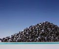 Activated coal-based carbon for treatment applications