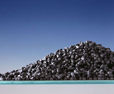 Activated coal-based carbon for treatment applications