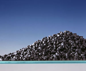 Activated coal-based carbon for treatment applications
