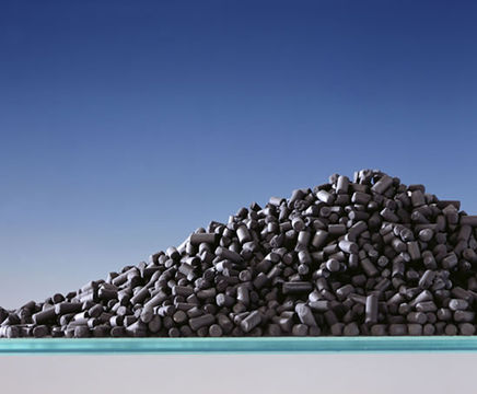 Activated coal-based carbon for treatment applications