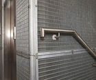 Variable steel gratings for architectural screening