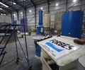 Wetted packed towers for gas scrubbing