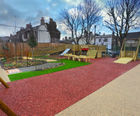 Rubber mulch safety surfacing for play areas