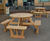 Round iroko 8-seater picnic table and benches 1