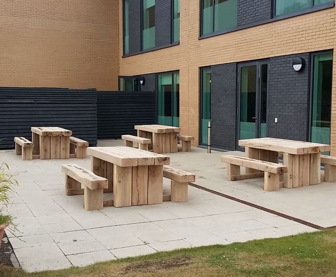 Robust green oak picnic suites for Nike's UK head office