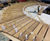 Bespoke curved iroko wall seat 4