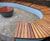 Bespoke curved iroko wall seat 5