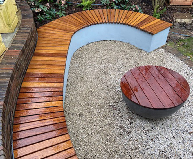 Bespoke curved iroko wall seat