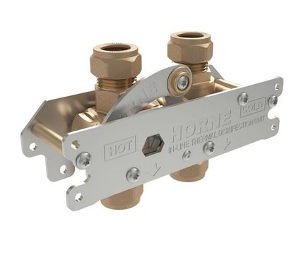 In-line thermal disinfection unit for showers, taps and TMVs
