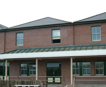 Glazed entrance canopy - Tywyn railway station, Wales