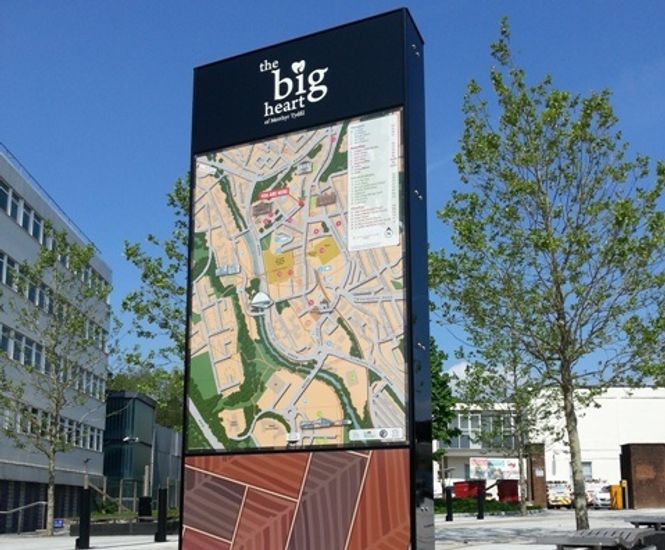 Contemporary wayfinding monoliths for business district