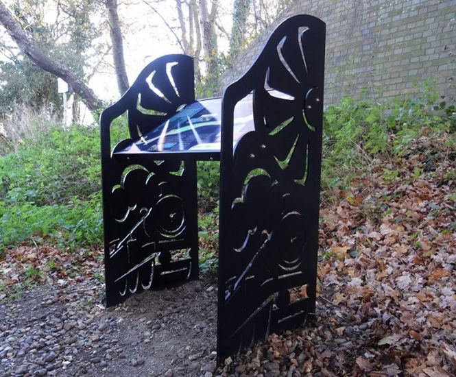 Train-themed signage for Alban Way cycle path