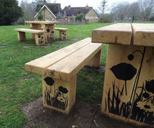 Engraved timber picnic tables, seats and bins for park