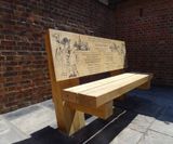 Bespoke engraved oak seat commemorates town crier - on this page