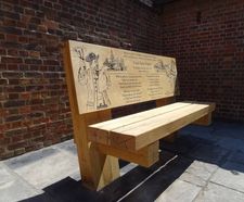 Bespoke engraved oak seat commemorates town crier
