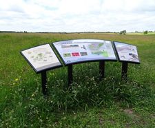 Curved metal interpretation signs for nature reserve