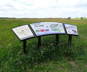 Curved metal interpretation signs for nature reserve