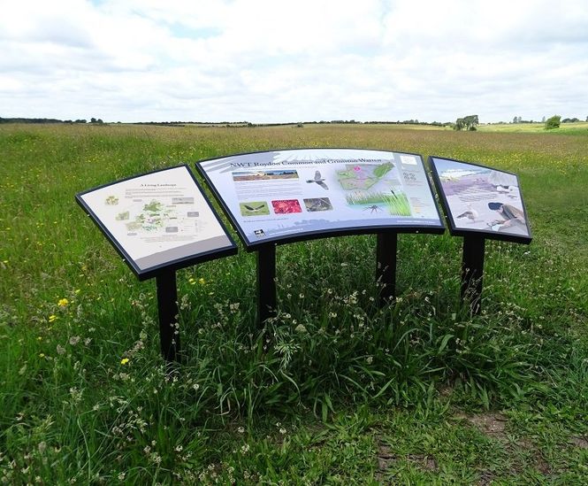 Curved metal interpretation signs for nature reserve