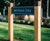 Grenadier Badging Sign - oak and aluminium outdoor signage 1