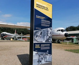Enigma Monolith - stainless steel outdoor wayfinding sign system