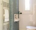 Adur 400 curved front stainless steel heated towel rail