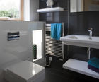 Coombe flat front stainless steel heated towel rail