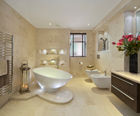 Adur 620 curved front stainless steel heated towel rail